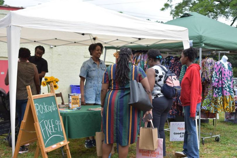 Visitors browse vendors at the Black Girl Book Fair.